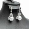 Boucles d'oreilles pendantes perles blanches acier inoxydable avec zircons