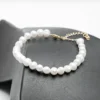 Bracelet parure Multi-graines perles d'eau douce acier finition dorée