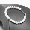 Bracelet Vert Émeraude - Ascellà Algérie Bracelet élégant perles d'eau douce naturelles blanches fermoir acier inoxydable argenté Ascellà Algérie