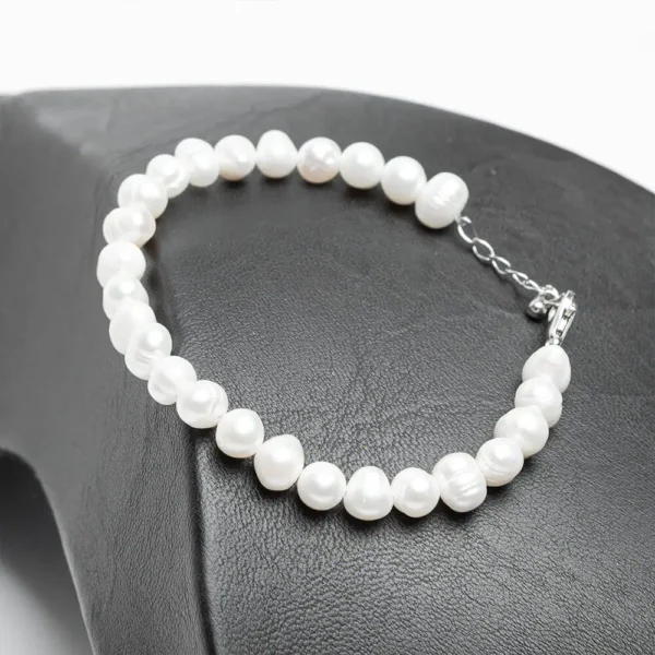 Bracelet élégant perles d'eau douce naturelles blanches fermoir acier inoxydable argenté Ascellà Algérie