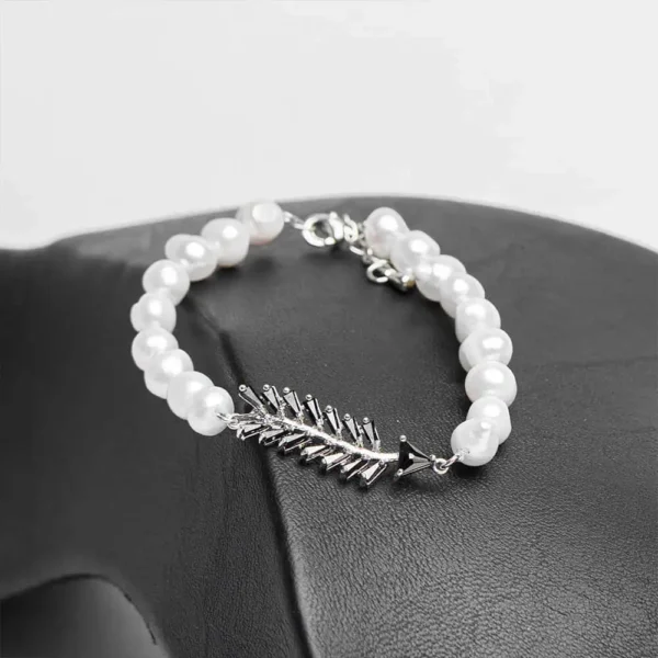 Bracelet parure La plume d'obsidienne perles d'eau douce zircons noirs acier