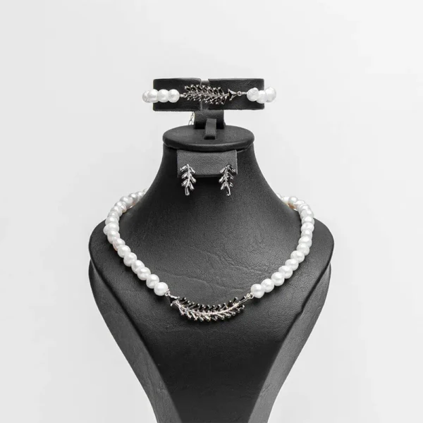 Parure complète La plume d'obsidienne perles d'eau douce zircons noirs acier inoxydable