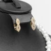 Boucles d'oreilles créoles parure L'infini doré zircons cristaux finition dorée acier inoxydable