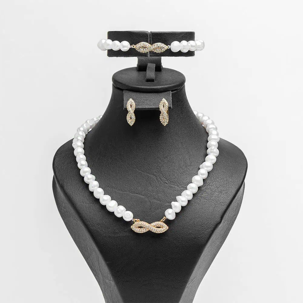 Parure complète L'infini doré perles d'eau douce zircons finition dorée acier inoxydable