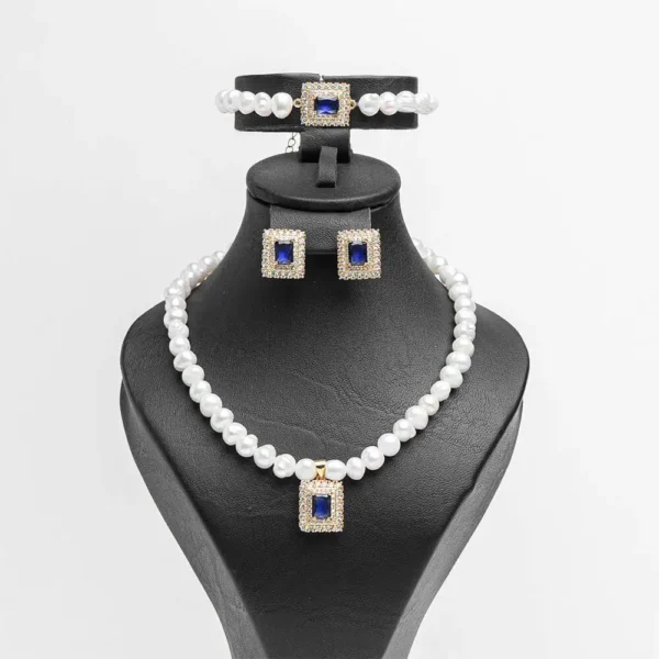 Parure complète Cœur d'océan perles blanches zircons bleus acier inoxydable