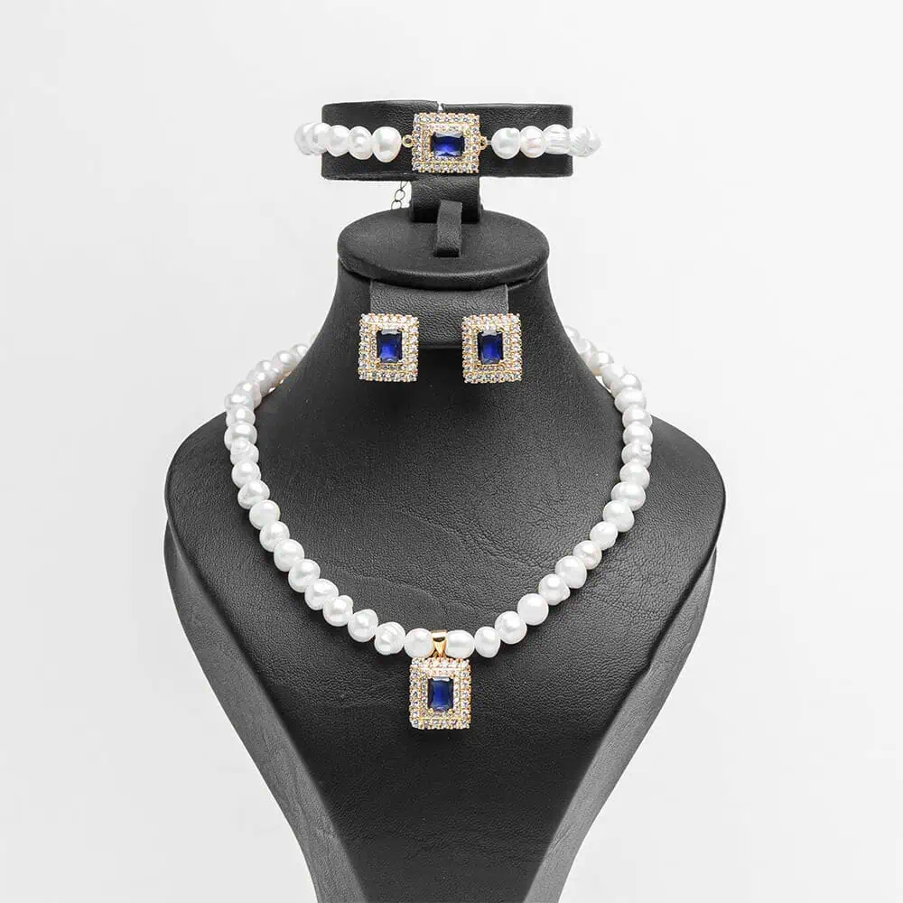 Parure complète Cœur d'océan perles blanches zircons bleus acier inoxydable