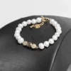 Bracelet parure Panache perles d'eau douce zircons cristaux finition dorée
