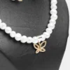 Collier pendentif parure Papillon royal doré perles blanches papillon zircons dorés