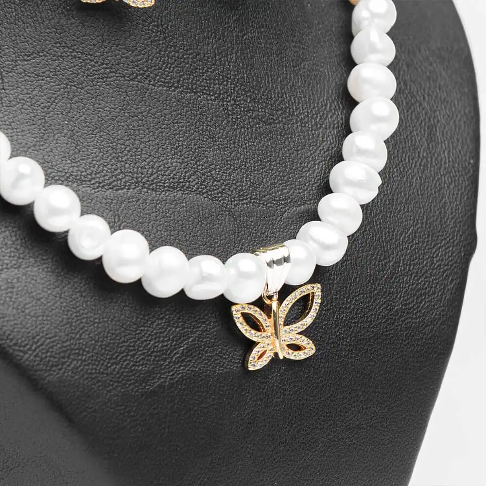 Collier pendentif parure Papillon royal doré perles blanches papillon zircons dorés