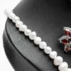 Détail perles d'eau douce naturelles collier La grenade rubis