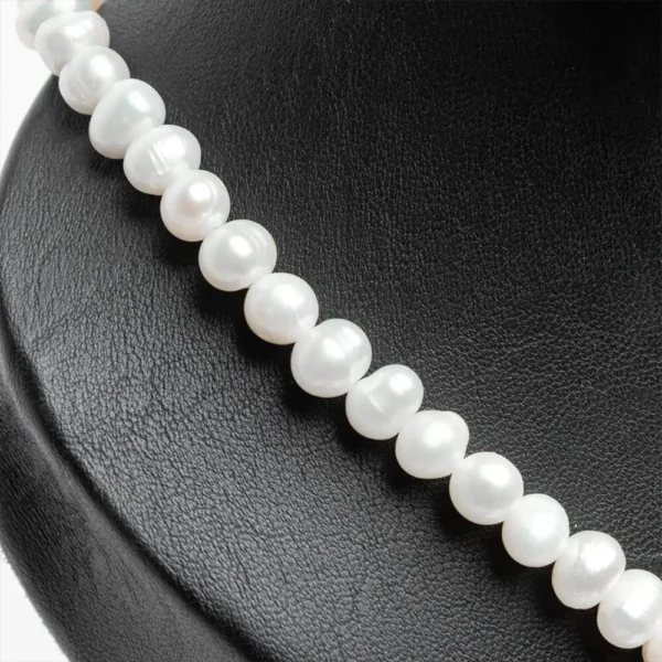 Gros plan perles d'eau douce naturelles